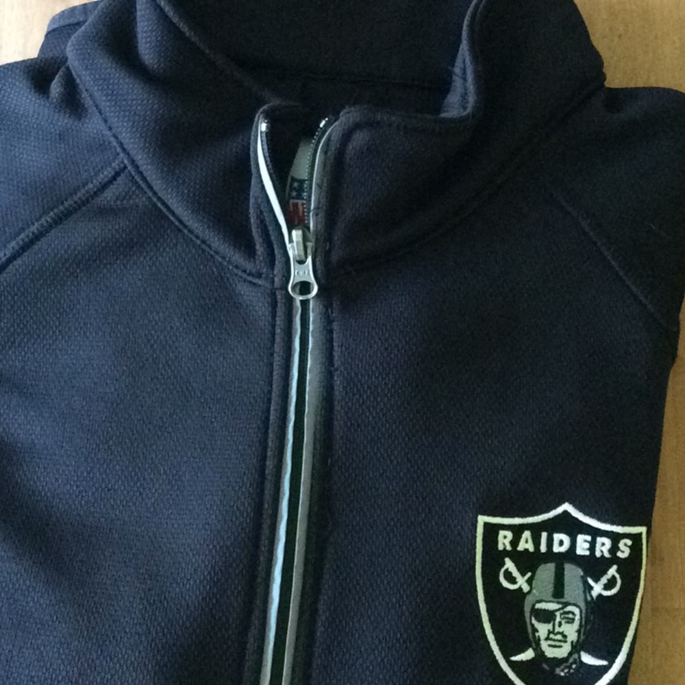 Official NFL Oakland Raider quarter zip pullover.